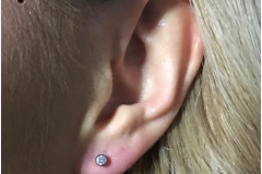 Ear lobe with NeoMetal. Inkhaus Tattoo.