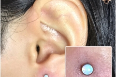Ear lobe with NeoMetal. Inkhaus Tattoo.