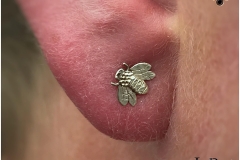 Ear lobe with LeRoi. Inkhaus Tattoo.