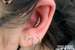 Conch piercing w/ Industrial Strength Prium cluster.