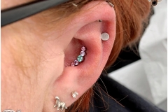 Conch piercing with Industrial Strength Swarovski Prium Cluster.