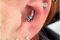 Conch piercing with Industrial Strength Swarovski Prium Cluster.