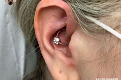 Daith piercing w/ LeRoi cluster.