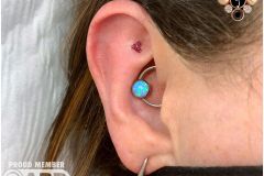 Daith piercing w/ industrial strength CBR and faux rook.