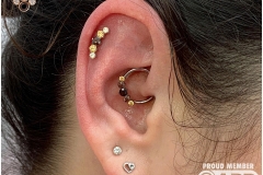 Daith Piercing with Industrial Strength CBR. Inkhaus Tattoo.