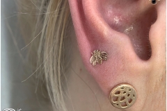 Upper Lobe w/ Yellow Gold Bee from LeRoi. Inkhaus Tattoo.