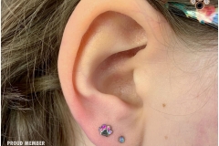 Second Ear Lobe Piercing with Industrial Strength PawPrint. Inkhaus Tattoo.