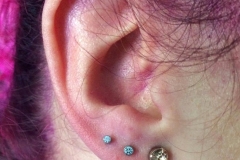 Second and Third Ear Piercings with NeoMetal. Inkhaus Tattoo