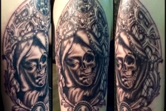 Memento Mori upper arm in greyscale.
