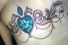 Greyscale Underbust w/ Colour Gem. Inkhaus Tattoo.