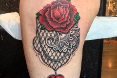 Neo-Traditional red rose with red jewel.