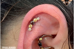 Flat Piercing w/ Industrial Strength Prium Cluster. Inkhaus Tattoo.