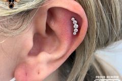 Helix piercing w/ Industrial Strength Prium cluster.