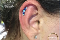 Helix Piercing with Industrial Strength Prium. Inkhaus Tattoo.