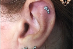 Helix Piercing with Anatometal Gem Cluster. Inkhaus Tattoo.