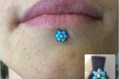 Labret with Anatometal Flower. Inkhaus Tattoo.