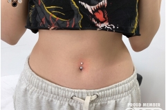 Navel Piercing w/ LeRoi Navel Curve. Inkhaus Tattoo.