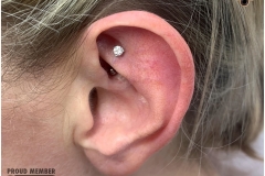 Rook Piercing with Swarovski. Inkhaus Tattoo.