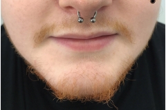 Septum Piercing w/ Circular Barbell. Inkhaus Tattoo.