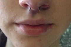 Septum Piercing with Retainer. Inkhaus Tattoo.