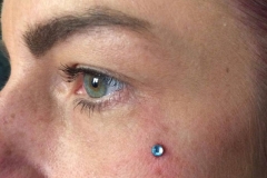 Cheek Surface Anchor. Inkhaus Tattoo.