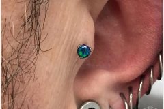Healed Tragus w/ Industrial Strength Opal. Inkhaus Tattoo.