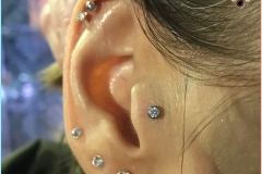 Tragus Piercing with NeoMetal. Inkhaus Tattoo.
