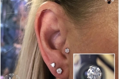 Tragus Piercing with Industrial Strength Swarovski. Inkhaus Tattoo.
