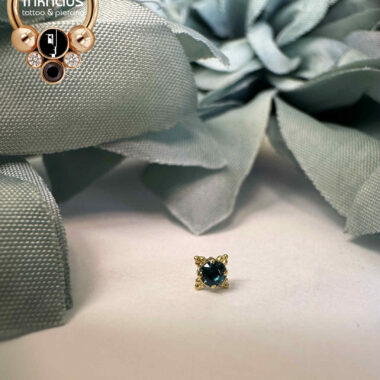 Anatometal 18 Karat Yellow Gold Faceted Zia w/ London Blue CZ.